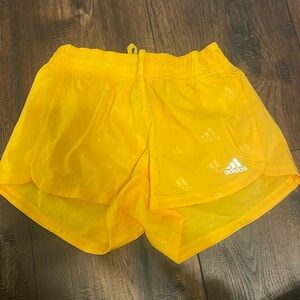 Brand new yellow adidas running shorts